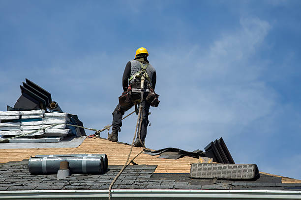 Professional Roof Replacement technician working in Claremont, VA